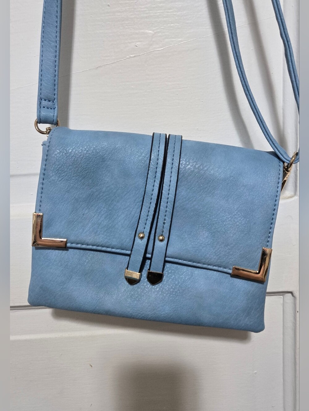 Light Blue Crossbody Bag with Polished Corner Accents And Vegan Leather